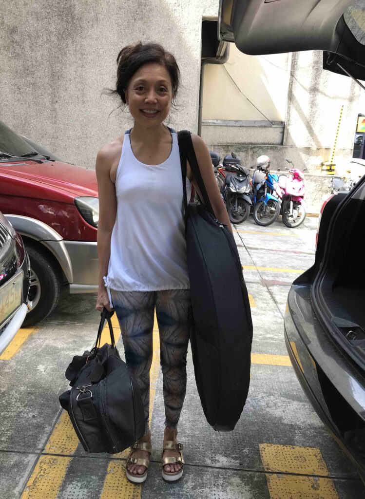 Rosan Cruz carrying a 38-inch Paiste Planet Earth Gong at Rebel Yoga in Makati